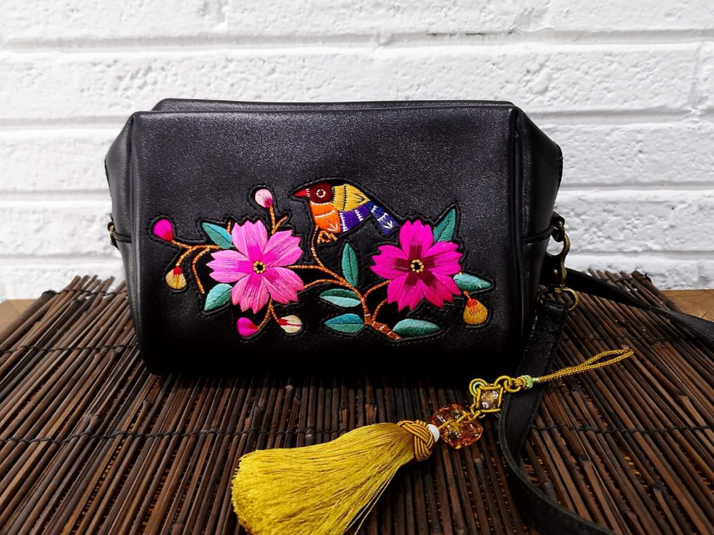 Leather hotsell embroidered bag